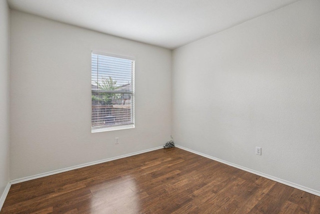 13413 Lismore Ln, Pflugerville, TX 78660 - spare room with wood finished floors and baseboards