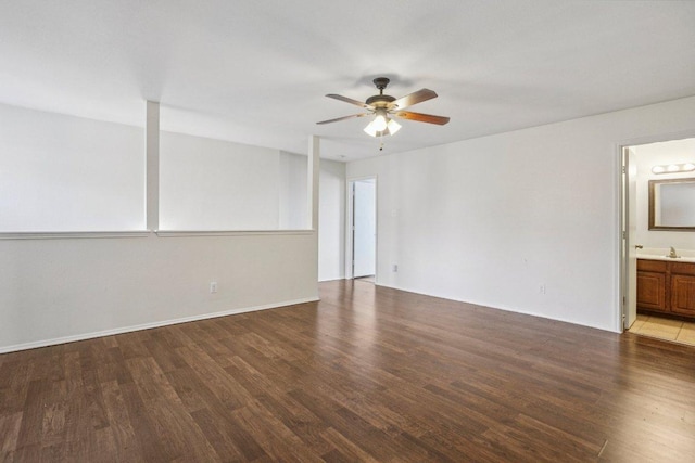 13413 Lismore Ln, Pflugerville, TX 78660 - empty room with wood finished floors and a ceiling fan
