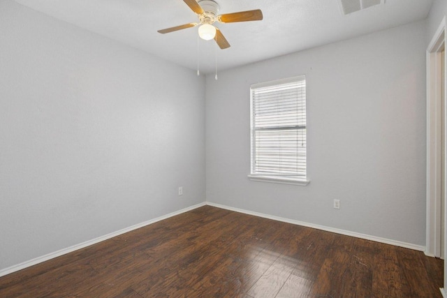 13413 Lismore Ln, Pflugerville, TX 78660 - empty room featuring dark wood-type flooring and a ceiling fan