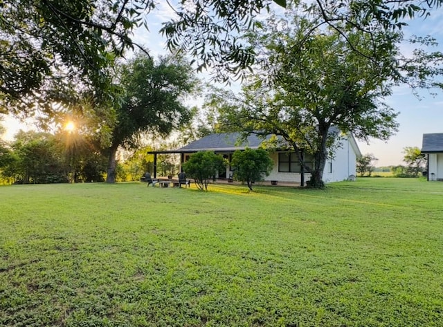 702 Pleasant Grove Rd, Elgin, TX 78621 - view of grassy yard
