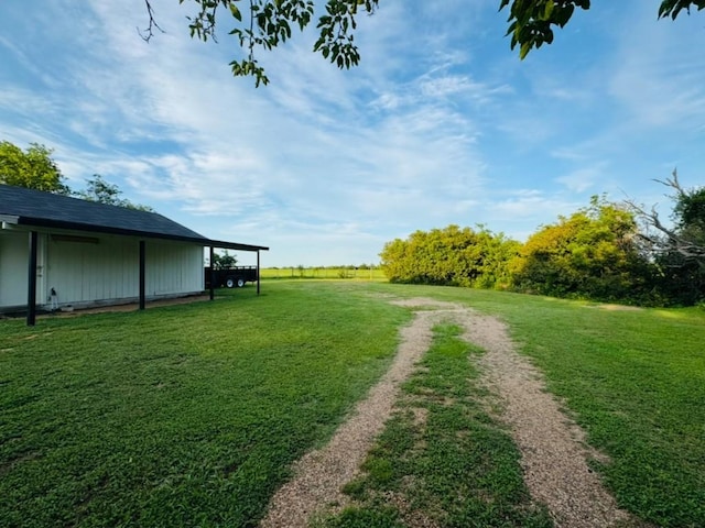 702 Pleasant Grove Rd, Elgin, TX 78621 - view of green lawn