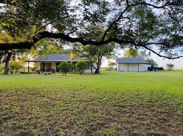 702 Pleasant Grove Rd, Elgin, TX 78621 - view of grassy yard