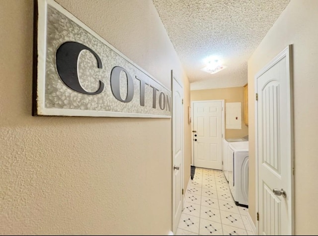 702 Pleasant Grove Rd, Elgin, TX 78621 - laundry area featuring separate washer and dryer, a textured ceiling, light tile patterned flooring, cabinet space, and electric panel