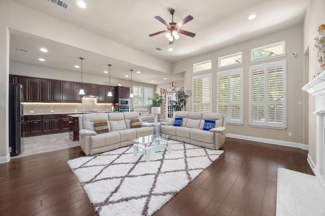 14405 Laurinburg Dr, Austin, TX 78717 - living area featuring ceiling fan, a high end fireplace, dark wood-style floors, and recessed lighting