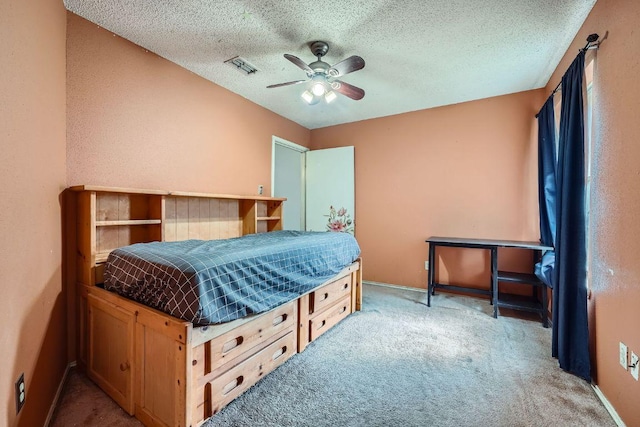 14305 Vandever St, Austin, TX 78725 - bedroom with light carpet, a textured ceiling, and a ceiling fan