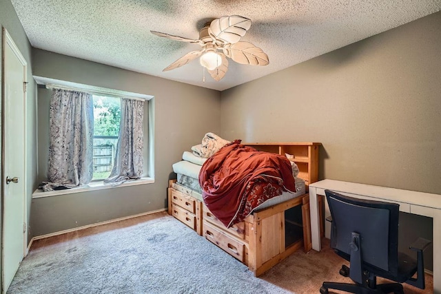 14305 Vandever St, Austin, TX 78725 - carpeted bedroom with a textured ceiling and ceiling fan