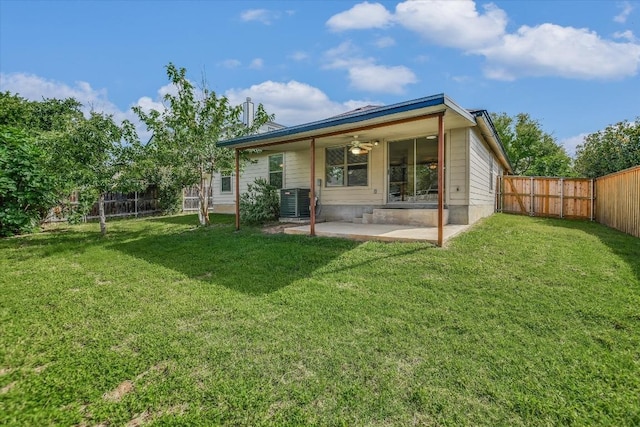 301 Wildwood Dr, Georgetown, TX 78633 - back of house featuring a ceiling fan, a patio area, and a fenced backyard