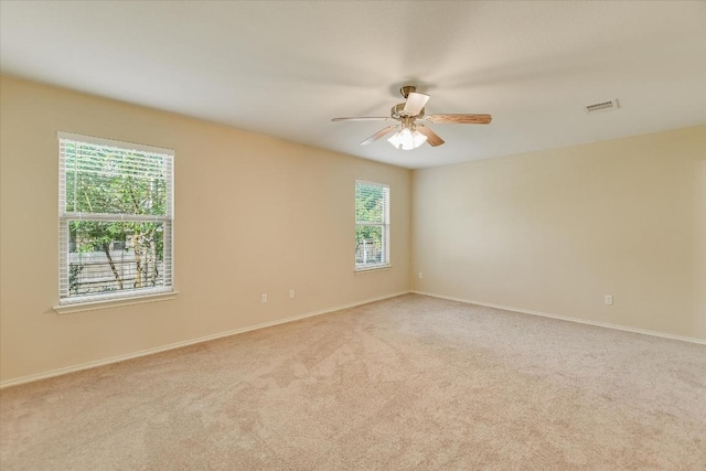 301 Wildwood Dr, Georgetown, TX 78633 - carpeted spare room with ceiling fan and baseboards