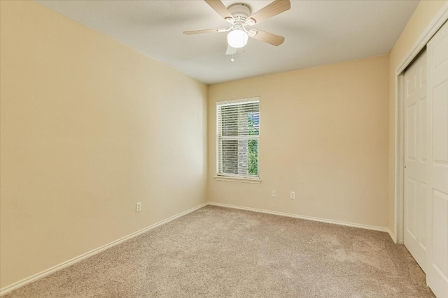 301 Wildwood Dr, Georgetown, TX 78633 - unfurnished bedroom featuring carpet flooring, a closet, and ceiling fan