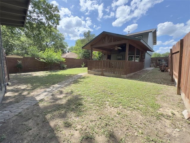 4503 E Stassney Ln, Austin, TX 78744 - fenced backyard with a ceiling fan
