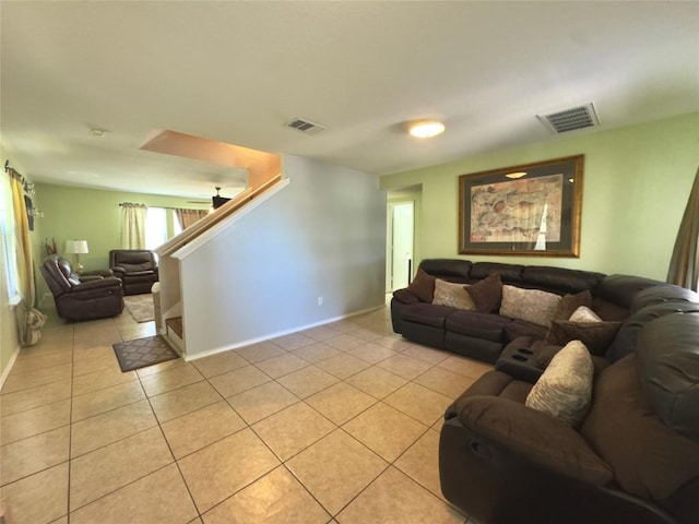 551 Abundance Ln, Kyle, TX 78640 - living area with light tile patterned floors and stairway