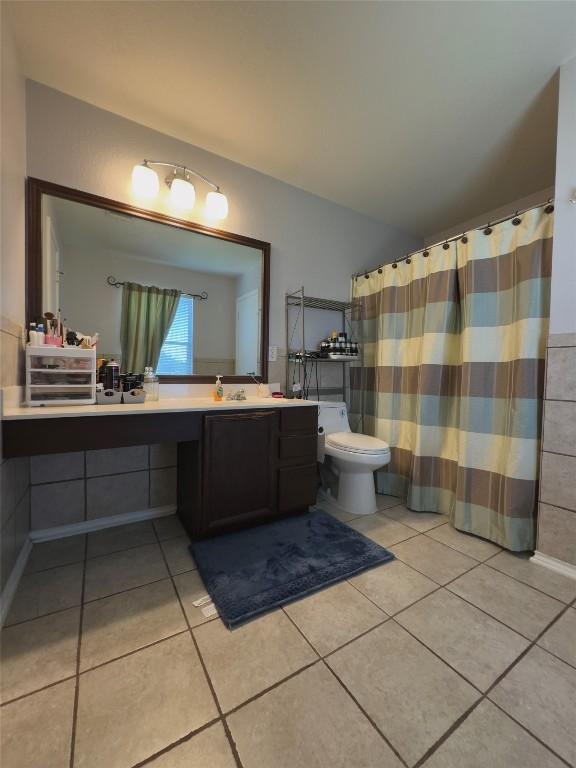 551 Abundance Ln, Kyle, TX 78640 - bathroom with vanity and tile patterned flooring