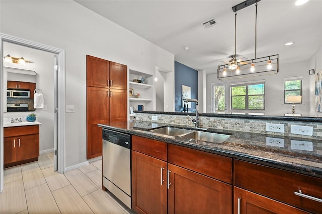 1115 Kinney Ave Unit 6, Austin, TX 78704 - kitchen with stainless steel appliances, backsplash, dark stone counters, open shelves, and a ceiling fan