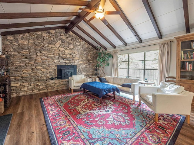 6801 Bryn Mawr Dr, Austin, TX 78723 - living room with wood finished floors, a wood stove, and a ceiling fan