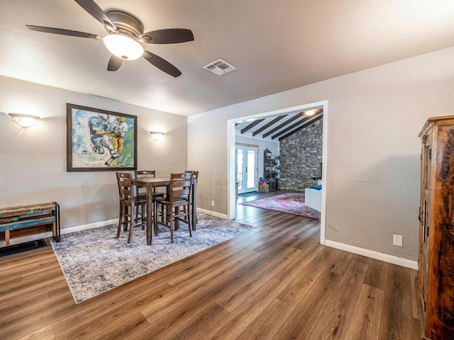 6801 Bryn Mawr Dr, Austin, TX 78723 - dining area featuring wood finished floors, a ceiling fan, vaulted ceiling, and french doors