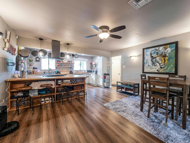 6801 Bryn Mawr Dr, Austin, TX 78723 - dining space with dark wood-style floors and ceiling fan