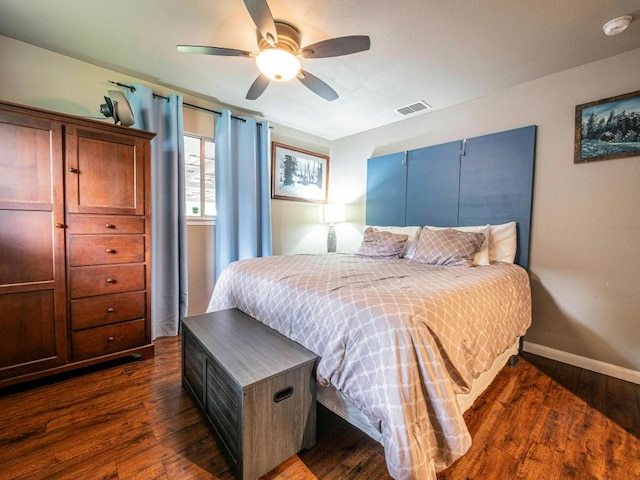6801 Bryn Mawr Dr, Austin, TX 78723 - bedroom featuring dark wood-style floors and a ceiling fan