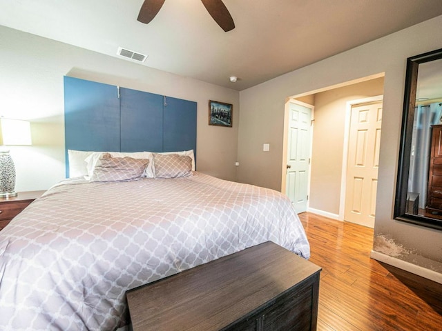 6801 Bryn Mawr Dr, Austin, TX 78723 - bedroom featuring wood finished floors and a ceiling fan