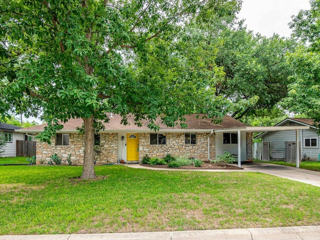 6801 Bryn Mawr Dr, Austin, TX 78723 - ranch-style home with stone siding, driveway, a shingled roof, and a carport