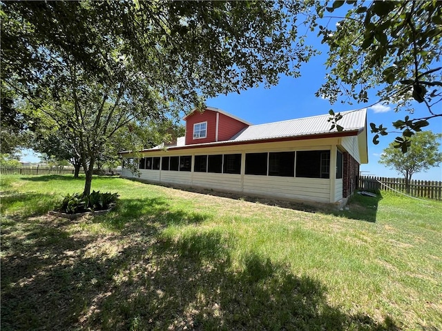 2120 Fm 1704, Elgin, TX 78621 - rear view of property with a fenced backyard and a metal roof