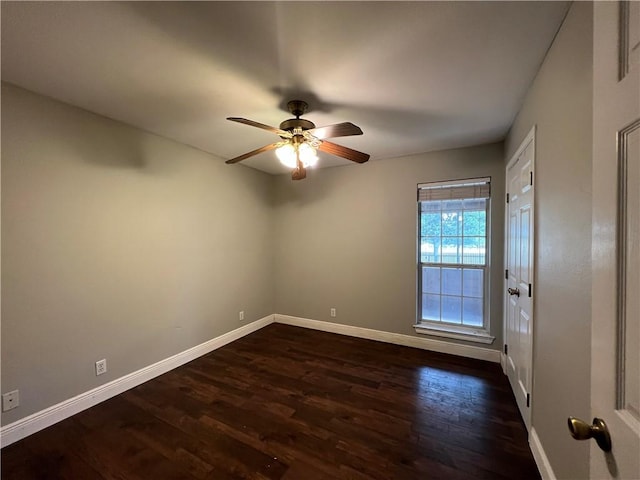 2120 Fm 1704, Elgin, TX 78621 - empty room with a ceiling fan and dark wood-type flooring