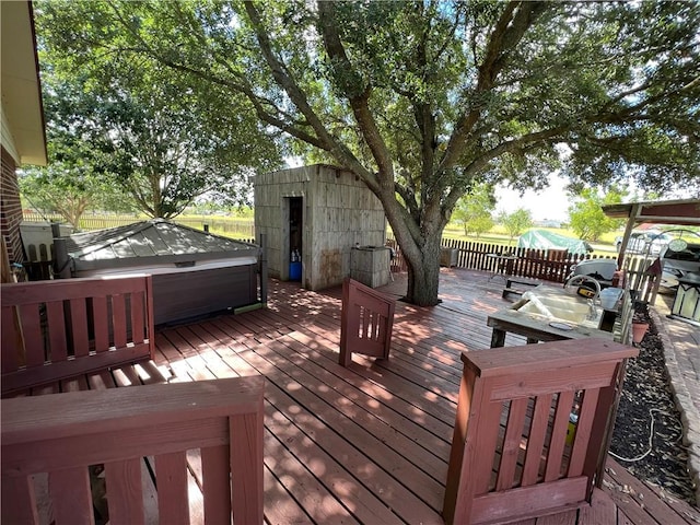 2120 Fm 1704, Elgin, TX 78621 - deck with a hot tub and a storage unit