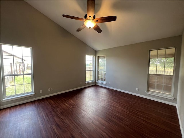 2120 Fm 1704, Elgin, TX 78621 - empty room featuring plenty of natural light, a ceiling fan, dark wood-style flooring, and high vaulted ceiling
