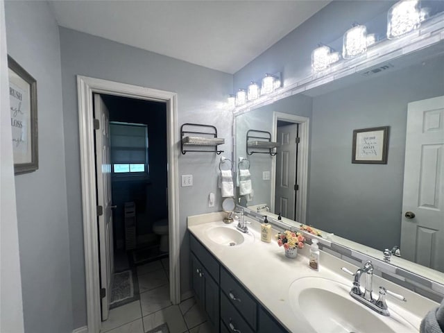 2120 Fm 1704, Elgin, TX 78621 - full bath featuring double vanity and tile patterned floors