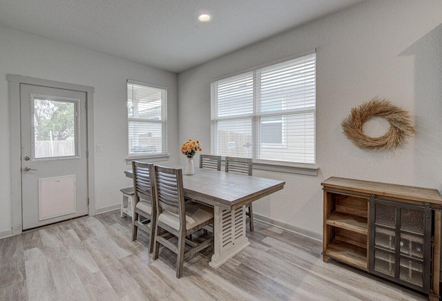 261 Deserti Rd, Leander, TX 78641 - dining area featuring light wood-style flooring