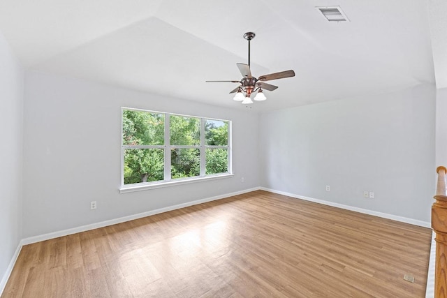 15213 Mallard Green Ln, Austin, TX 78728 - spare room with light wood-style floors, vaulted ceiling, and ceiling fan