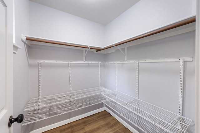 15213 Mallard Green Ln, Austin, TX 78728 - walk in closet with wood finished floors
