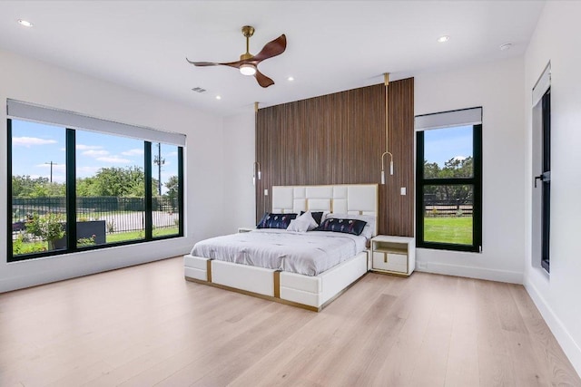 1806 Lauren Dr, Spicewood, TX 78669 - bedroom featuring light wood-style floors, recessed lighting, and a ceiling fan