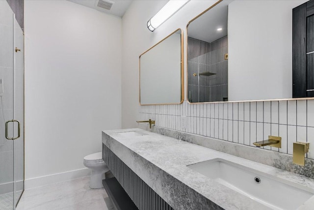 1806 Lauren Dr, Spicewood, TX 78669 - full bathroom with a shower stall, tasteful backsplash, and double vanity