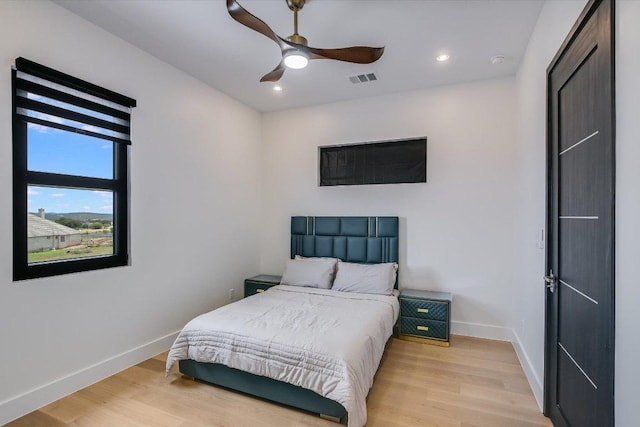 1806 Lauren Dr, Spicewood, TX 78669 - bedroom with light wood-style floors, recessed lighting, and a ceiling fan