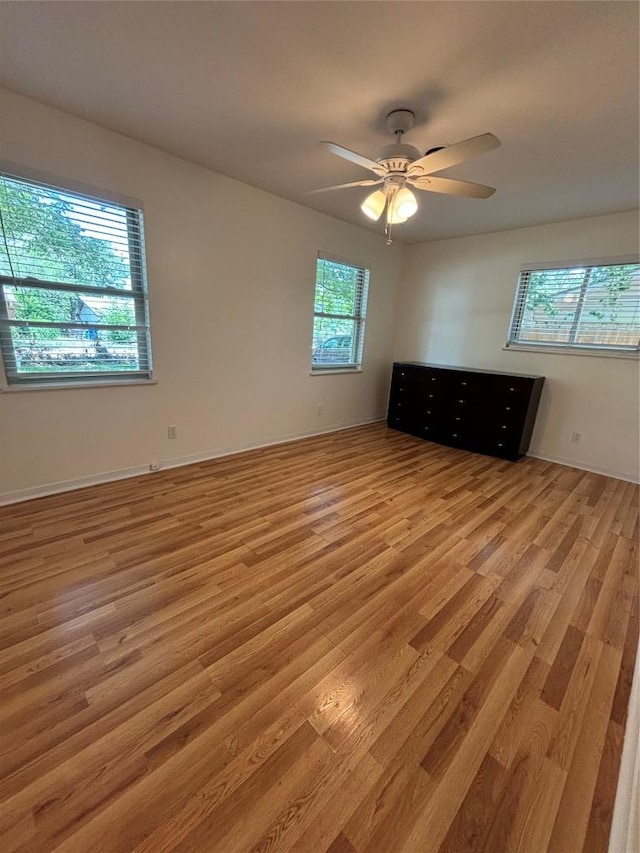 3205 Whites Dr, Austin, TX 78735 - unfurnished room featuring light wood-type flooring and ceiling fan