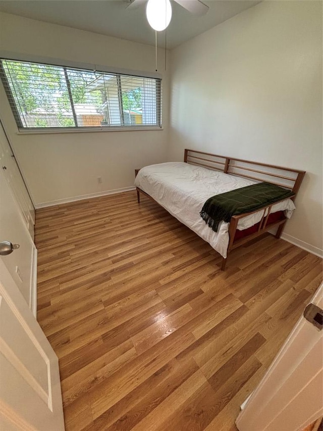 3205 Whites Dr, Austin, TX 78735 - bedroom featuring light wood-style flooring and ceiling fan