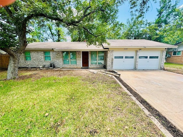 3205 Whites Dr, Austin, TX 78735 - view of front of home featuring an attached garage, stone siding, concrete driveway, and a front lawn