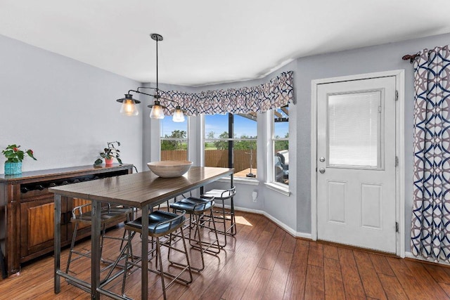 906 Pecos Cv, Leander, TX 78641 - dining space featuring wood finished floors and baseboards
