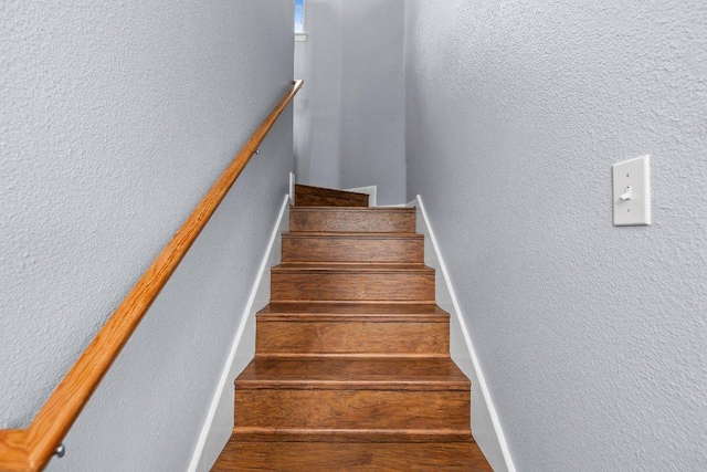 906 Pecos Cv, Leander, TX 78641 - stairway featuring a textured wall