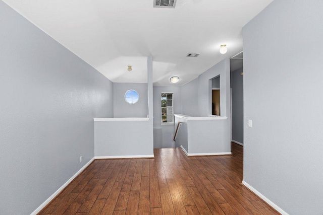 906 Pecos Cv, Leander, TX 78641 - unfurnished room featuring baseboards and hardwood / wood-style flooring