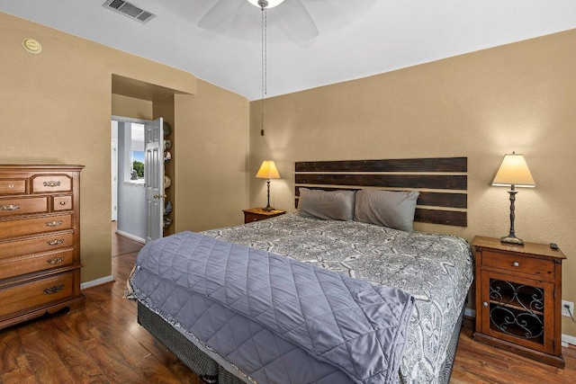 906 Pecos Cv, Leander, TX 78641 - bedroom with dark wood-style floors and a ceiling fan