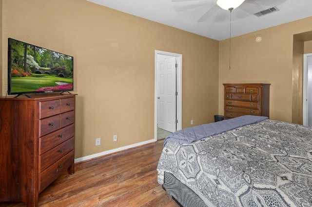 906 Pecos Cv, Leander, TX 78641 - bedroom featuring wood finished floors and a ceiling fan