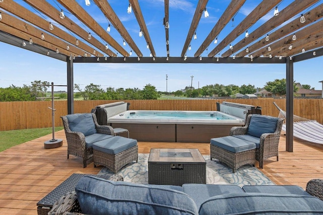 906 Pecos Cv, Leander, TX 78641 - fenced backyard with a hot tub, a deck, and a pergola