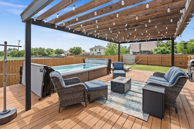 906 Pecos Cv, Leander, TX 78641 - wooden terrace featuring a hot tub, a fenced backyard, and a pergola
