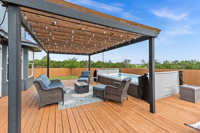 906 Pecos Cv, Leander, TX 78641 - wooden terrace featuring a hot tub, a fenced backyard, outdoor lounge area, and a pergola