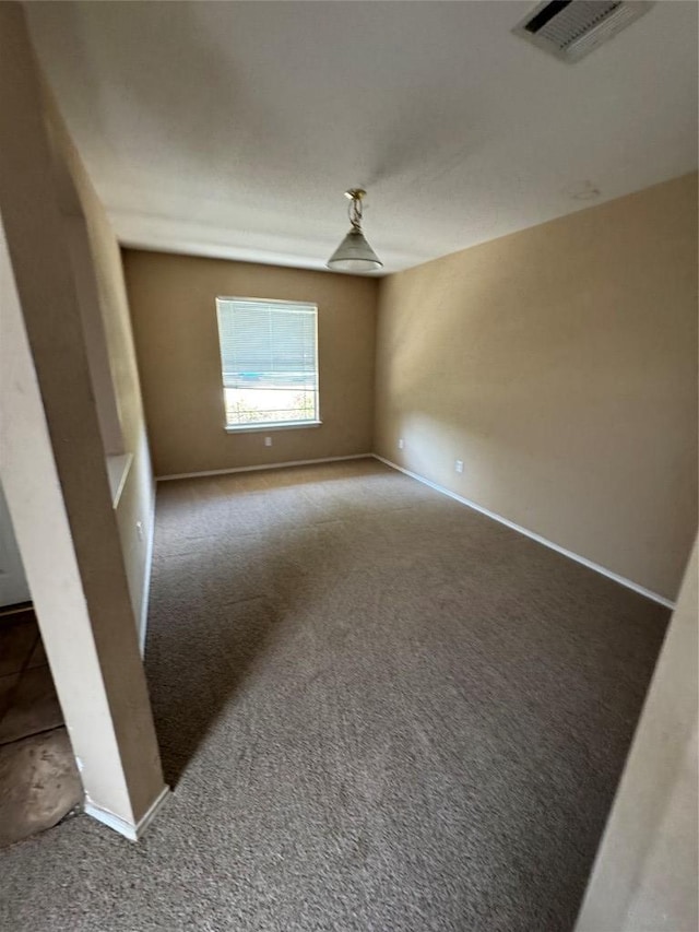 209 Lake Washington Dr, Kyle, TX 78640 - empty room featuring carpet and baseboards