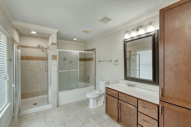 2801 Adelen Ln, Round Rock, TX 78664 - bathroom with vanity, crown molding, tiled shower / bath combo, and a textured ceiling