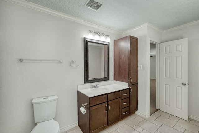 2801 Adelen Ln, Round Rock, TX 78664 - bathroom with vanity, a textured ceiling, tile patterned floors, and ornamental molding