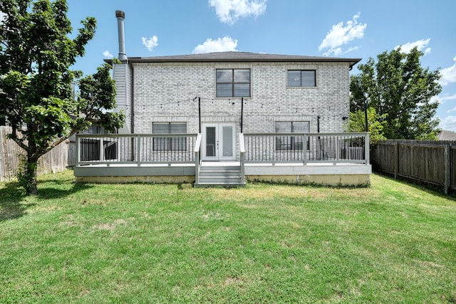 2801 Adelen Ln, Round Rock, TX 78664 - rear view of house featuring a deck, brick siding, a fenced backyard, and french doors