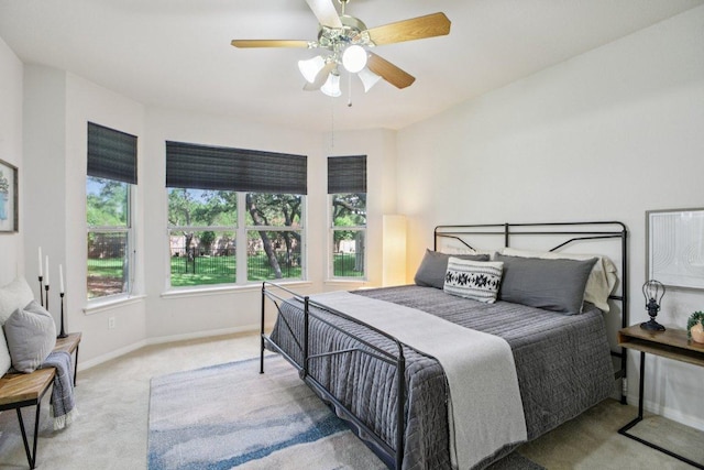 136 Trail Of The Flowers, Georgetown, TX 78633 - carpeted bedroom featuring baseboards and ceiling fan